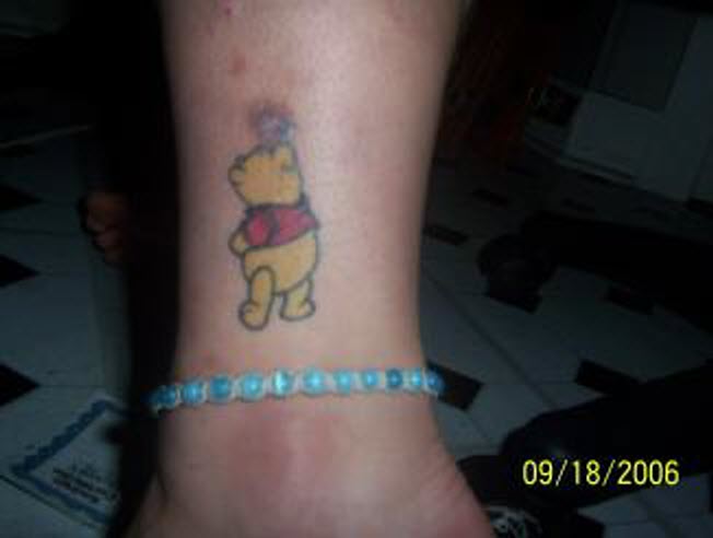  and I see some beautiful tattoos in my time winnie-the-pooh-tattoo